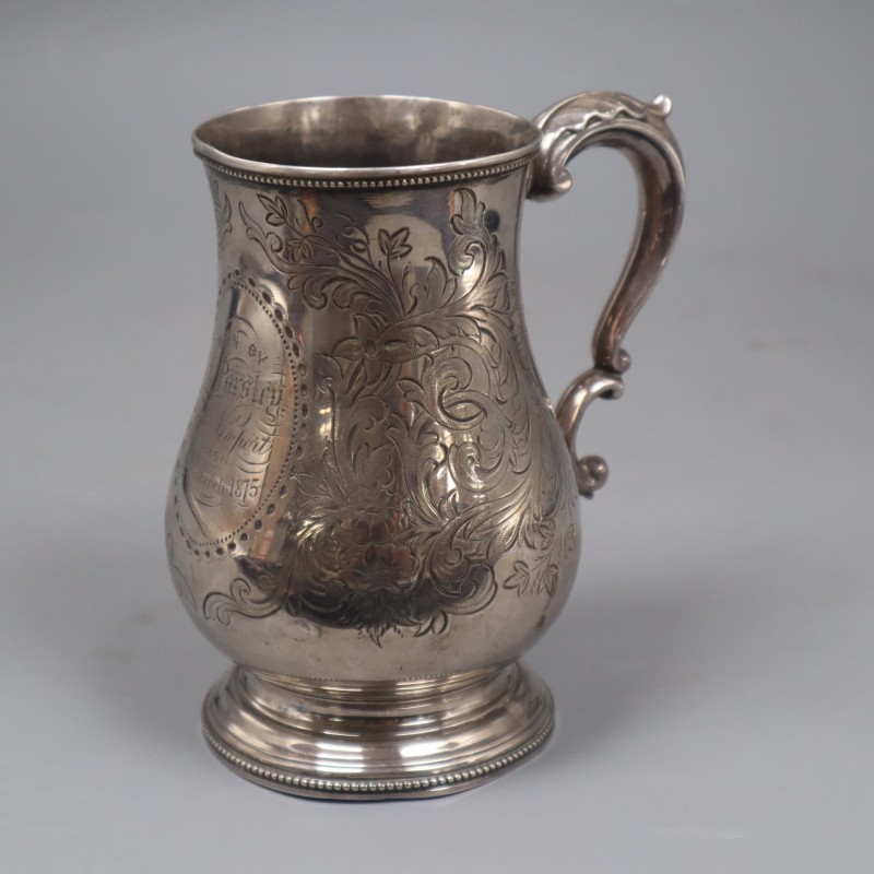 A Victorian provincial silver engraved baluster mug, Josiah Williams & Co, Exeter, 1873, 14.6cm, 8.5 oz.
